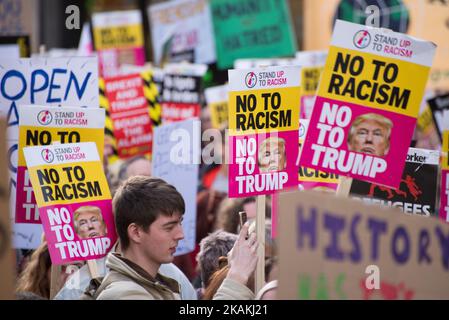 Placards at an anti-Trump Â‘Muslim BanÂ’ demonstration on Saturday Feb. 4, 2017 in Manchester, United Kingdom. The demonstration, which happened in solidarity with other demonstrations in other cities, was prompted by President Trump signing an executive order halting the entire US refugee programme and banning anyone from Iran, Iraq, Libya, Somalia, Sudan, Syria and Yemen as well as people with dual nationality. (Photo by Jonathan Nicholson/NurPhoto) *** Please Use Credit from Credit Field *** Stock Photo