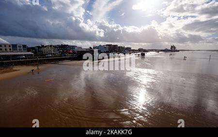 View from the Grand Pier looking south,Weston-Super-Mare, North Somerset. The See Monster exhibit on the horizon on the right Stock Photo