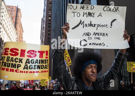 Hundreds march in protest of President Trump on the one-month anniversary of his inauguration in Chicago on February 19, 2017. (Photo by Max Herman/NurPhoto) *** Please Use Credit from Credit Field *** Stock Photo