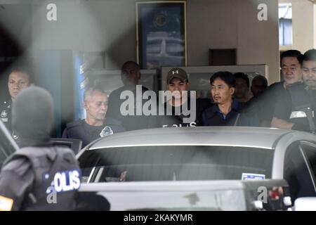 North Korean national Ri Jong Chol (C) is escorted with a heavy police presence as he leaves the Sepang police headquaters in Sepang on March 3, 2017. The only North Korean arrested over the dramatic airport assassination of Kim Jong-Nam is to be deported, Malaysia said on March 2, as it announced the abrupt cancellation of a visa-waiver programme with Pyongyang. (Photo by Chris Jung/NurPhoto) *** Please Use Credit from Credit Field *** Stock Photo