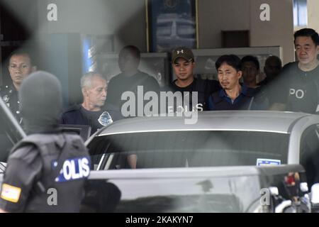 North Korean national Ri Jong Chol (C) is escorted with a heavy police presence as he leaves the Sepang police headquaters in Sepang on March 3, 2017. The only North Korean arrested over the dramatic airport assassination of Kim Jong-Nam is to be deported, Malaysia said on March 2, as it announced the abrupt cancellation of a visa-waiver programme with Pyongyang. (Photo by Chris Jung/NurPhoto) *** Please Use Credit from Credit Field *** Stock Photo