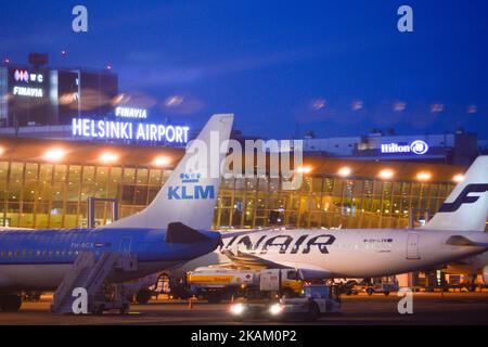 A view of KLM and Finnair planes docked at Helsinki-Vantaa Airport. Finnair’s customers should prepare for flight delays today, on Monday, March 6, due to a labour dispute between the Finnish Aviation Union (IAU) and Service Sector Employers (Palta) that could have an effect on flights operated by Finnair. On Monday, March 06, 2017, in Helsinki, Finland. Photo by Artur Widak *** Please Use Credit from Credit Field ***  Stock Photo