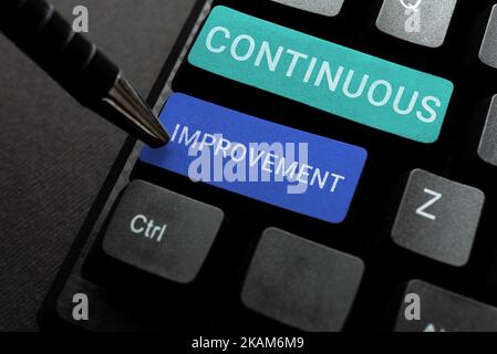 Conceptual caption Continuous Improvement. Business showcase making small consistent improvements over time Computer Keyboard And Symbol.Information Stock Photo