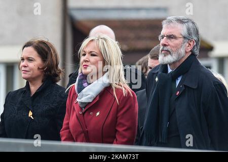 (Left-Right) Sinn Fein Mary Lou McDonald, Sinn Fein President Gerry Adams and Northern Ireland Sinn Fein Leader, Michelle O'Neill, walk in front of the coffin of former Northern Ireland Deputy First Minister Martin McGuinness in procession in the Bogside neighbourhood of Derry on the way to St. Columba's Church Longtower for Requiem Mass, On Thursday, March 23, 2017, in Londonderry, Northern Ireland. Photo by Artur Widak *** Please Use Credit from Credit Field ***  Stock Photo