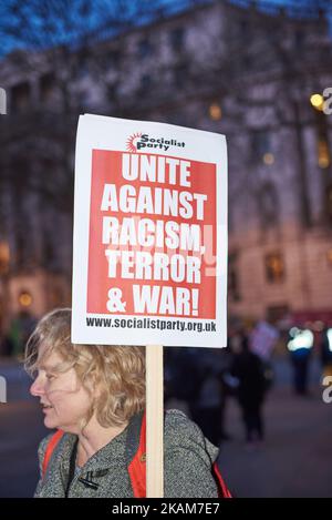 Vigil in Trafalgar Square in central London on March 23, 2017 in solidarity with the victims of the March 22 terror attack at the British parliament and on Westminster Bridge. Britain's parliament reopened on Thursday with a minute's silence in a gesture of defiance a day after an attacker sowed terror in the heart of Westminster, killing three people before being shot dead. Sombre-looking lawmakers in a packed House of Commons chamber bowed their heads and police officers also marked the silence standing outside the headquarters of London's Metropolitan Police nearby. (Photo by Karyn Louise/N Stock Photo