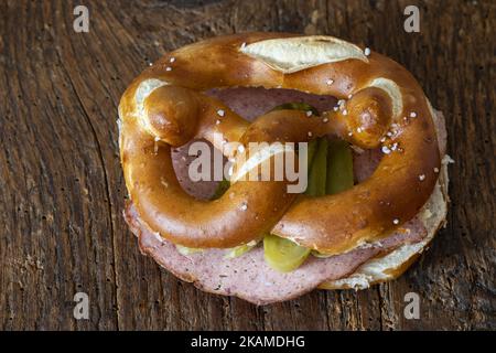 Meat Loaf In A Pretzel On Wood Stock Photo