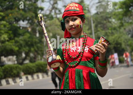 Bangladeshi people participate in a parade to celebrate the first day of the Bangla New Year or 'Pahela Baisshakh', in Dhaka, Bangladesh, Friday, April 14, 2017. Thousands of Bangladeshi people on Friday celebrated their new year with fairs, concerts and rallies. (Photo by Mamunur Rashid/NurPhoto) *** Please Use Credit from Credit Field *** Stock Photo