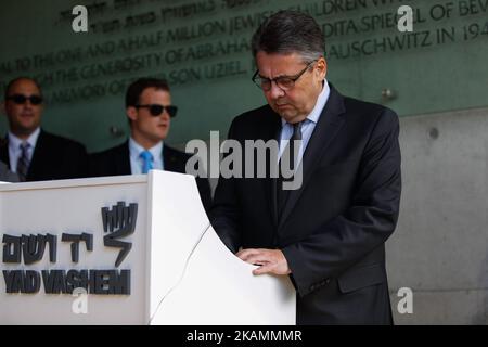 German foreign minister Sigmar Gabriel signs the guest book in the Yad Vashem Holocaust Memorial in Jerusalem, Israel, 24 April 2017. (Photo by Corinna Kern/NurPhoto) *** Please Use Credit from Credit Field *** Stock Photo