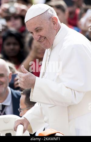 Pope Francis gives the thumbs up sign as he leaves St. Peter's Square during the weekly general audience at the Vatican, Wednesday, April 26, 2017. (Photo by Massimo Valicchia/NurPhoto) *** Please Use Credit from Credit Field *** Stock Photo