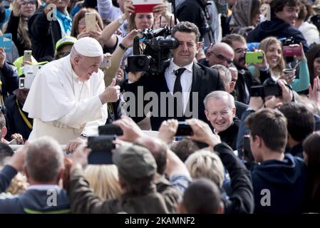 Pope Francis gives the thumbs up sign as he leaves St. Peter's Square during the weekly general audience at the Vatican, Wednesday, April 26, 2017. (Photo by Massimo Valicchia/NurPhoto) *** Please Use Credit from Credit Field *** Stock Photo