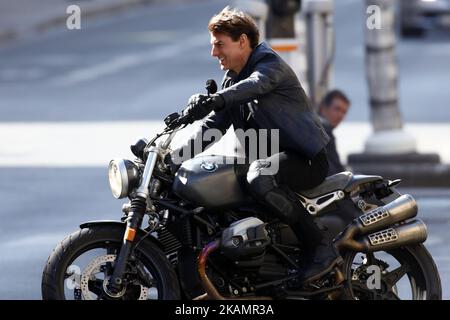 Actor Tom Cruise is seen riding a BMW bike on the set of Mission Impossible 6 Gemini on Avenue de l Opera on April 30 2017 in Paris France. Photo by Mehdi Taamallah NurPhoto