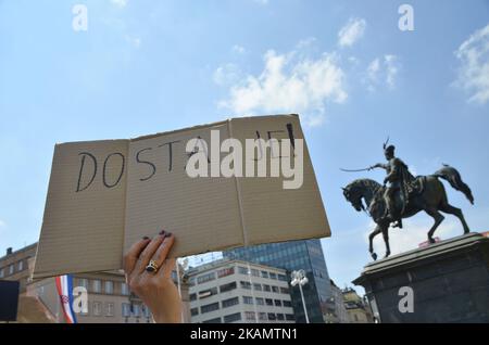 Community of Little People has organized a protest called 'Protest of Little people' against Distraint law, against Property tax law, against Lex Agrokor law and many other problems in the country in Ban Josip Jelacic square. in Zagreb, Croatia during celebration of May day on 1st May 2017. (Photo by Alen Gurovic/NurPhoto) *** Please Use Credit from Credit Field *** Stock Photo