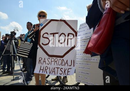 Community of Little People has organized a protest called 'Protest of Little people' against Distraint law, against Property tax law, against Lex Agrokor law and many other problems in the country in Ban Josip Jelacic square. in Zagreb, Croatia during celebration of May day on 1st May 2017. (Photo by Alen Gurovic/NurPhoto) *** Please Use Credit from Credit Field *** Stock Photo