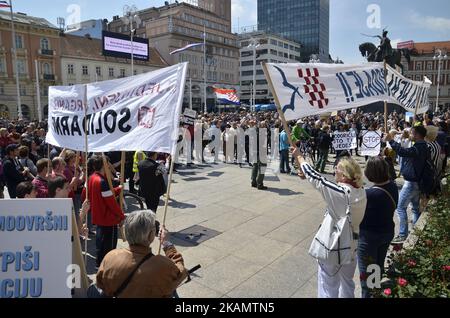 Community of Little People has organized a protest called 'Protest of Little people' against Distraint law, against Property tax law, against Lex Agrokor law and many other problems in the country in Ban Josip Jelacic square. in Zagreb, Croatia during celebration of May day on 1st May 2017. (Photo by Alen Gurovic/NurPhoto) *** Please Use Credit from Credit Field *** Stock Photo