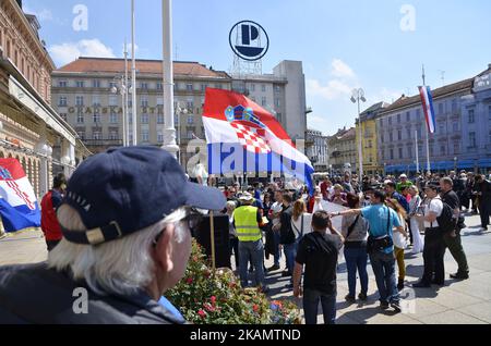 Community of Little People has organized a protest called 'Protest of Little people' against Distraint law, against Property tax law, against Lex Agrokor law and many other problems in the country in Ban Josip Jelacic square. in Zagreb, Croatia during celebration of May day on 1st May 2017. (Photo by Alen Gurovic/NurPhoto) *** Please Use Credit from Credit Field *** Stock Photo