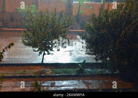 Cairo, Egypt, October 25 2022: foggy unclear scene of the streets due to heavy rains flooding with stormy wind, thunder and lightning in Cairo, Egypt, Stock Photo