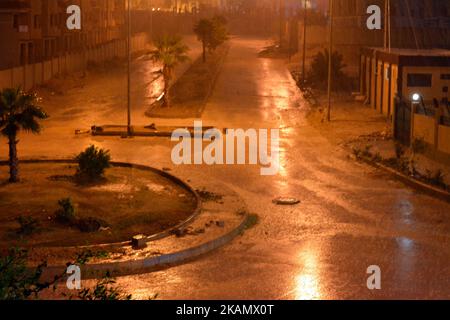 Cairo, Egypt, October 25 2022: foggy unclear scene of the streets due to heavy rains flooding with stormy wind, thunder and lightning in Cairo, Egypt, Stock Photo