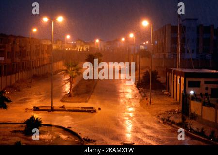 Cairo, Egypt, October 25 2022: foggy unclear scene of the streets due to heavy rains flooding with stormy wind, thunder and lightning in Cairo, Egypt, Stock Photo