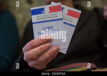A photo taken on May 7, 2017 in Paris, France, shows a electoral card. For the second round of the French Presidential elections, Frenhc citizens have the choice between Emmanuel Macron, leader of En Marche (on forward) and Marine Le Pen, leader of Front National (far right party). The polling stations will closed at 8pm and the first result will be announced at this time. The definitive result will be published only on Wednesday 10 May 2017. (Photo by Michaud Gael/NurPhoto) *** Please Use Credit from Credit Field *** Stock Photo