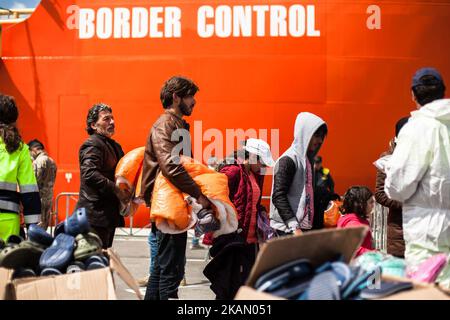 Landing of immigrate in the port of Salerno, Campania, Italy on May 9, 2017. The Siem Pilot ship carried about 900 migrants from Subsaharian, on the ship there was a dead body of child of three years old. (Photo by Paolo Manzo/NurPhoto) *** Please Use Credit from Credit Field *** Stock Photo