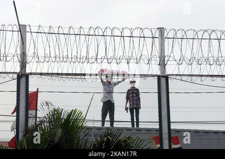 Supporters of Jakarta's governor Basuki Tjahaja Purnama or better known as 'Ahok' demonstrate at Jakarta Cipinang prison on May 9, 2017. Jakarta's Christian governor was jailed for two years after being found guilty of blasphemy, in a shock decision that has stoked concerns over rising religious intolerance in the world's most populous Muslim-majority nation. (Photo by Dasril Roszandi/NurPhoto) *** Please Use Credit from Credit Field *** Stock Photo