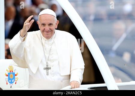 Pope Francis waves to devotees inside the popemobile at the Fatima Sanctuary in Leiria, Portugal, 12 May 2017. Pope Francis will preside over the commemoration of the centenary of the 'apparitions' of Our Lady to the three Shepherds in Cova da Iria in 1917 and will be present at the Shrine of Fatima on 13 May. (Photo by Pedro Fiuza/NurPhoto) *** Please Use Credit from Credit Field *** Stock Photo