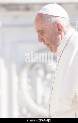 Pope Francis walks to his chair for his weekly general audience, in St. Peter's Square, at the Vatican, Wednesday, May 17, 2017. (Photo by Massimo Valicchia/NurPhoto) *** Please Use Credit from Credit Field *** Stock Photo