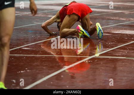 Sadik Mikhou prays after winning Men's 1500m final, during day five of Athletics at Baku 2017 - 4th Islamic Solidarity Games at Baku Olympic Stadium. On Saturday, May 20, 2017 in Baku, Azerbaijan. Photo by Artur Widak *** Please Use Credit from Credit Field ***  Stock Photo