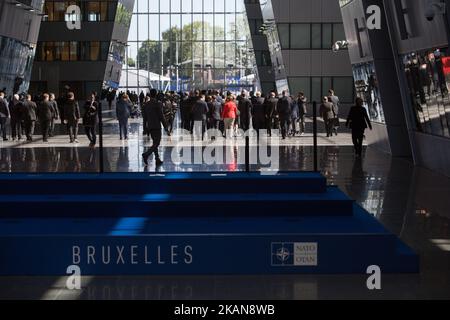 Angela Merkel, in red, walks away with other heads of State, Brussels, Belgium, May 25th 2017 (Photo by Arne Gillis/NurPhoto) *** Please Use Credit from Credit Field *** Stock Photo