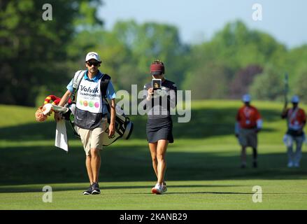 Belen Mozo of Spain and caddie walk on the fairway of the 6th hole during the third round of the LPGA Volvik Championship at Travis Pointe Country Club, Ann Arbor, MI, USA Saturday, May 27, 2017. (Photo by Jorge Lemus/NurPhoto) *** Please Use Credit from Credit Field *** Stock Photo