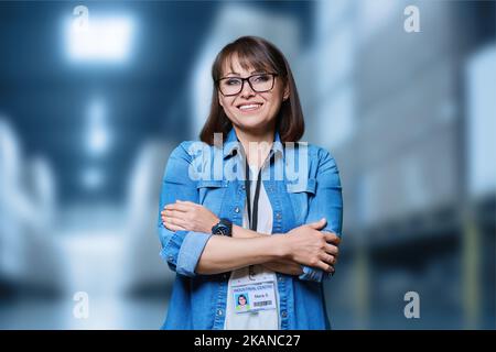 Portrait of woman manager worker in warehouse transporting and distributing Stock Photo