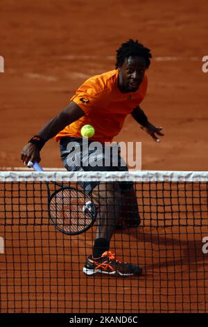 Gael Monfils of France returns to Dustin Brown of Germany during their first round match of the French Open tennis tournament at the Roland Garros stadium in Paris, France on May 30, 2017. (Photo by Mehdi Taamallah/NurPhoto) *** Please Use Credit from Credit Field *** Stock Photo