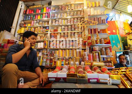 Indian shopkeeper wait for customers in the main wholesale market area of the city in Kolkata on June 1, 2017. India's economic growth slowed to 7.1 percent for the 2016-17 financial year,Growth for the 12 months ended March 31 was well below a revised figure of eight percent for the previous year, and follows the government's shock move last November to ban most of the currency in circulation. (Photo by Debajyoti Chakraborty/NurPhoto) *** Please Use Credit from Credit Field *** Stock Photo
