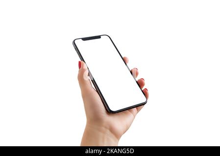 Smartphone with notch in woman hand close-up. Isolated screen and background in white for app presentation Stock Photo