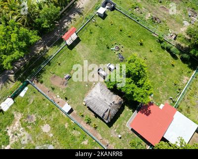 The drone view of resort houses in the green Playa El Espino beach, Usulutan, El Salvador, aerial Stock Photo