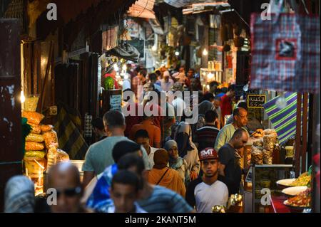 One of a very busy narrow streets inside Fes Medina. A scene from a daily life in Fes during the Ramadan 2017. On Monday, June 19, 2017, in Fes, Morocco. (Photo by Artur Widak/NurPhoto) *** Please Use Credit from Credit Field *** Stock Photo