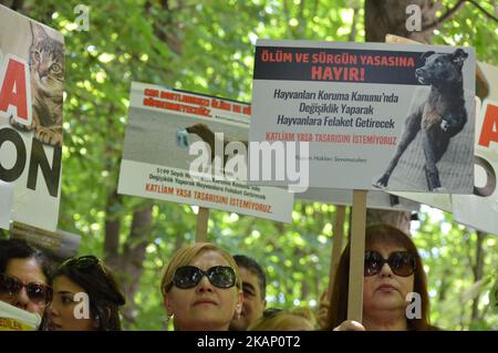 Women hold placards during a protest for animal rights in Ankara on July 01, 2017. Approximately 80 demonstrations take place all around Turkey on the same day, at the same time as the protesters mostly wear black clothes to object to the Turkish government's animal protection act. (Photo by Altan Gocher/NurPhoto) *** Please Use Credit from Credit Field *** Stock Photo