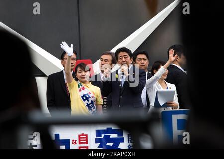 Japanese Prime Minister Shinzo Abe, president of the ruling Liberal Democratic Party, delivers his speech for his candidate Aya Nakamura to voters from atop of a campaign van with party's members during election campaign for Tokyo Metropolitan Assembly on July 1, 2017 in Akihabara, Tokyo, Japan. (Photo by Richard Atrero de Guzman/NurPhoto) *** Please Use Credit from Credit Field *** Stock Photo