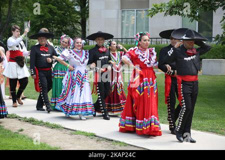 Members of a Mexican dance group take part in a multi-cultural Canada Day parade at Queens Park in downtown Toronto, Ontario, Canada, on July 01, 2017. Canadians across the country celebrated the 150th birthday of Canada (the 150th anniversary of Confederation). (Photo by Creative Touch Imaging Ltd./NurPhoto) *** Please Use Credit from Credit Field *** Stock Photo