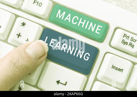 Writing displaying text Machine Learning. Business overview the concept that a computer can learn new data itself Stock Photo