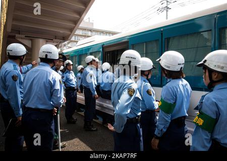 Japanese police are seen during a counter-protest action against "hate speech demonstration" in Nakahara, Kawasaki City, Kanagawa prefecture, Japan on July 16, 2017. (Photo by Richard Atrero de Guzman/NUR Photo) *** Please Use Credit from Credit Field *** Stock Photo