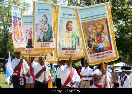 Tamil Catholics participate in prayers during the Feast of Our Lady of Madhu as part of a special pilgrimage in Ontario, Canada, on July 15, 2017. (Photo by Creative Touch Imaging Ltd./NurPhoto) *** Please Use Credit from Credit Field *** Stock Photo