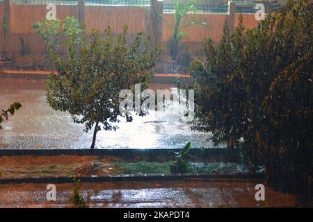 Cairo, Egypt, October 25 2022: foggy unclear scene of the streets due to heavy rains flooding with stormy wind, thunder and lightning in Cairo, Egypt, Stock Photo