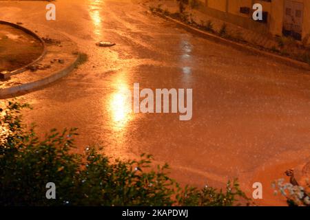 Cairo, Egypt, October 25 2022: foggy unclear scene of the streets due to heavy rains flooding with stormy wind, thunder and lightning in Cairo, Egypt, Stock Photo