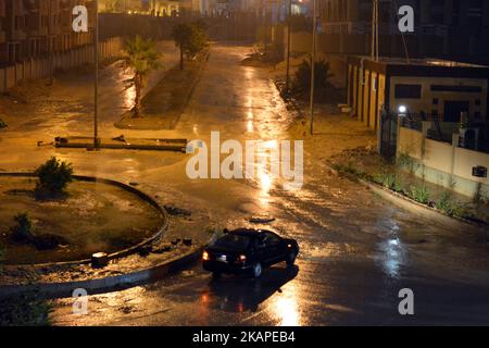 Cairo, Egypt, October 25 2022: foggy unclear scene of the streets due to heavy rains flooding with stormy wind, thunder and lightning in Cairo, Egypt, Stock Photo