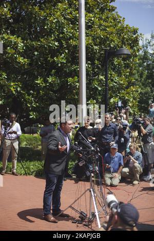 Alt-right blogger Jason Kessler waits for protesters to quiet before begnning a news conference in front of City Hall on August 13, 2017 in Charlottesville, Virginia. Kessler, who helped organize the Unite the Right rally one day earlier, blamed Charlottesville government officials and law enforcement for failing to protect the first amendment rights of the rally's participants, a collection of white supremacists, neo-Nazis, Ku Klux Klan members and alt-right supporters. (Photo by Shay Horse/NurPhoto) *** Please Use Credit from Credit Field *** Stock Photo