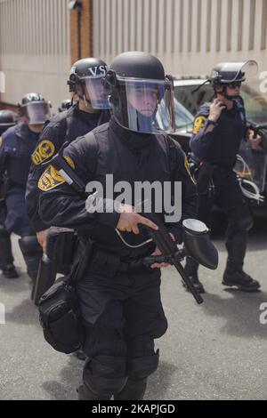 State Police came out heavily armed in a show of force before a news conference held by alt-right blogger Jason Kessler in front of City Hall August 13, 2017 in Charlottesville, Virginia. Kessler, who helped organize the Unite the Right rally one day earlier, blamed Charlottesville government officials and law enforcement for failing to protect the first amendment rights of the rally's participants, a collection of white supremacists, neo-Nazis, Ku Klux Klan members and alt-right supporters.. (Photo by Shay Horse/NurPhoto) *** Please Use Credit from Credit Field *** Stock Photo