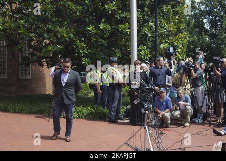 Alt-right blogger Jason Kessler waits for protesters to quiet before begnning a news conference in front of City Hall on August 13, 2017 in Charlottesville, Virginia. Kessler, who helped organize the Unite the Right rally one day earlier, blamed Charlottesville government officials and law enforcement for failing to protect the first amendment rights of the rally's participants, a collection of white supremacists, neo-Nazis, Ku Klux Klan members and alt-right supporters (Photo by Shay Horse/NurPhoto) *** Please Use Credit from Credit Field *** Stock Photo