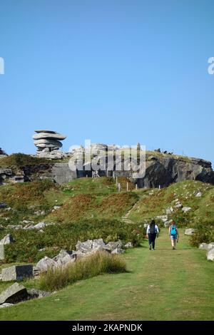 Two Female Hikers Walking Towards Stowe's Hill, Bodmin Moor, Cornwall, England, UK in September Stock Photo