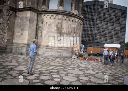 People in Berlin, Germany, on August 18, 2017 during a memorial to Earth attack of December 19, at Breitscheidplatz in Berlin, Germany . On December 19, 2016 Anis Amri , a Tunisian radical , drove a heavy truck into a crowded Christmas market at breitscheidplatz, Killing 12 pople and injuring 50. (Photo by Andrea Ronchini/NurPhoto) Stock Photo